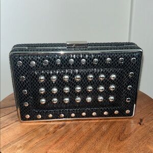 White House Black Market small handheld black and Silver Studded Clutch